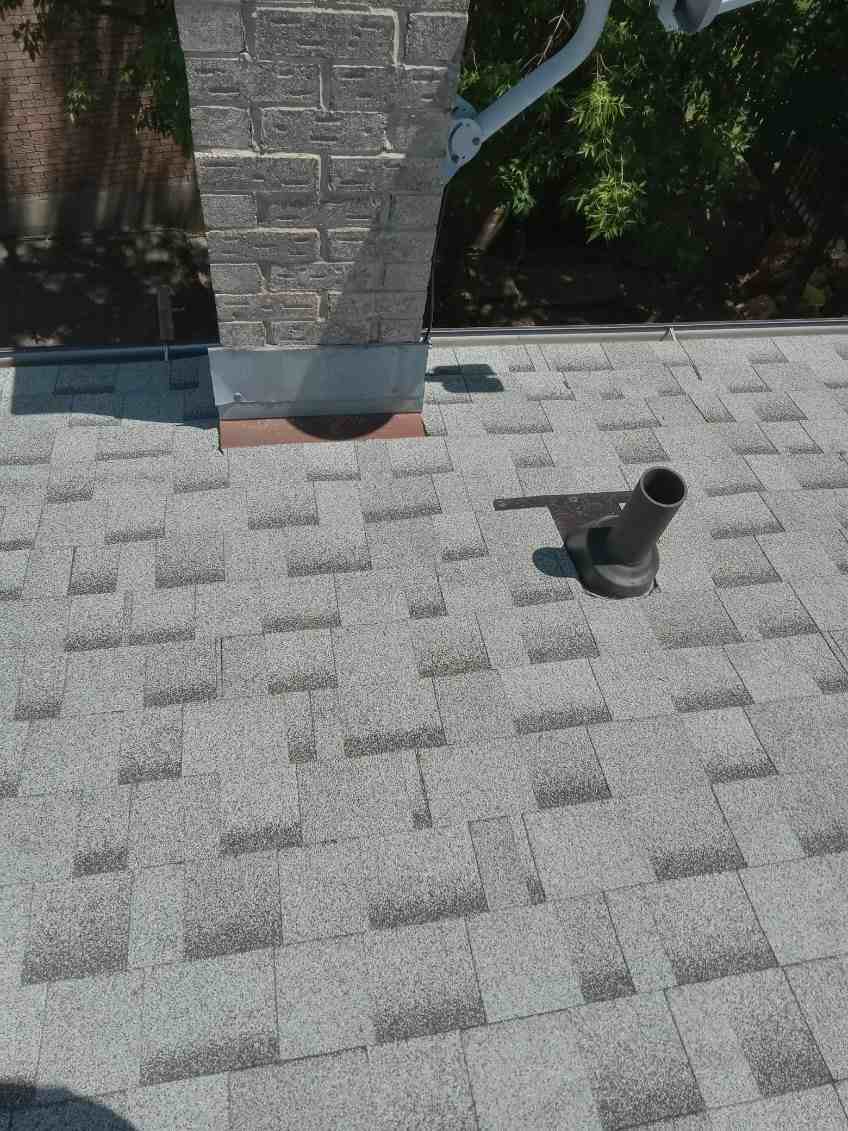JamrockRoofing premium shingle finish with vent and flashing